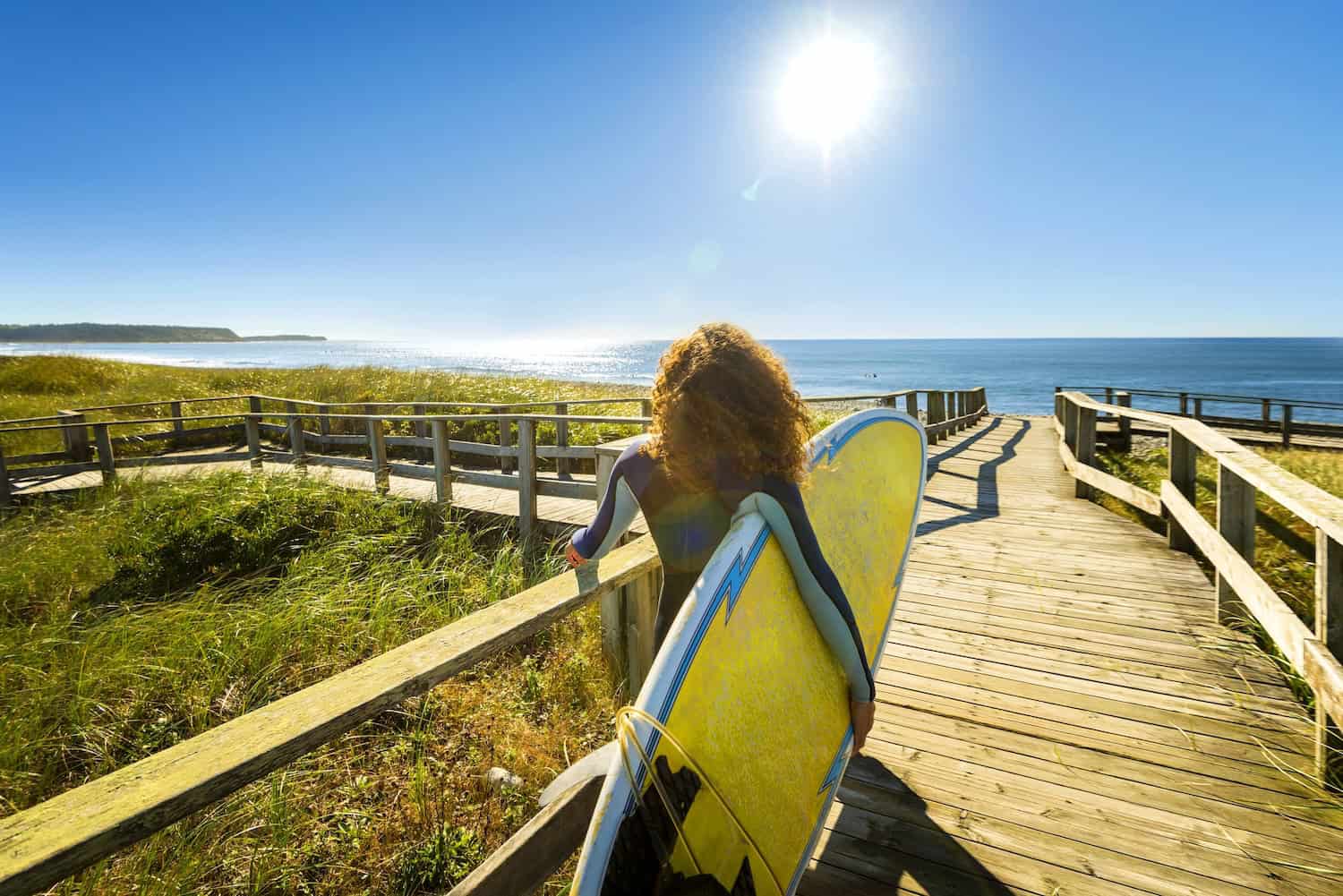 Surferin in Lawrencetown Beach in Nova Scotia.